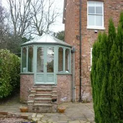 099 - Conservatory with Victorian roof spray finished in slate green