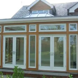 095 - Conservatory with double French doors and dental mould detail