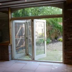 242 - Interior view of bifolding doors manufactured in Idigbo and spray finished in cream