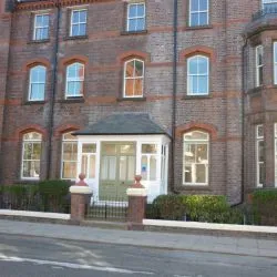 112 - Sash windows with vertical bar spray finished in white