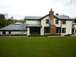 160 - Side elevation of property - products spray finished in a charcoal colour
