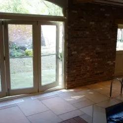 238 - Cottage bar style bifold doors spray finished in cream