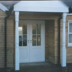 261 - Porch Entrance with Double Doors combining glazing and panelling in a white spray finish