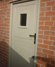 Stable door with a spray finish