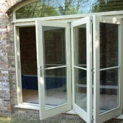 240 -Triple bifolding doors in a cottage bar design