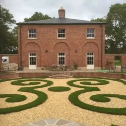 075 - Garden view of property with oversized doors with Georgian style windows and glazing