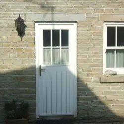 277 - Sash window divided into 6 and matching door with tongue and groove boards