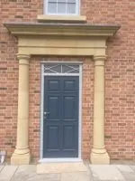 084 - Entrance panelled door with feature top light