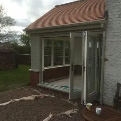 Orangery showing the bifolding doors open