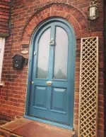 017 - Feature arched door with panelled base and arched glazing